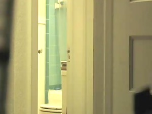 hidden webcam of woman after bathroom